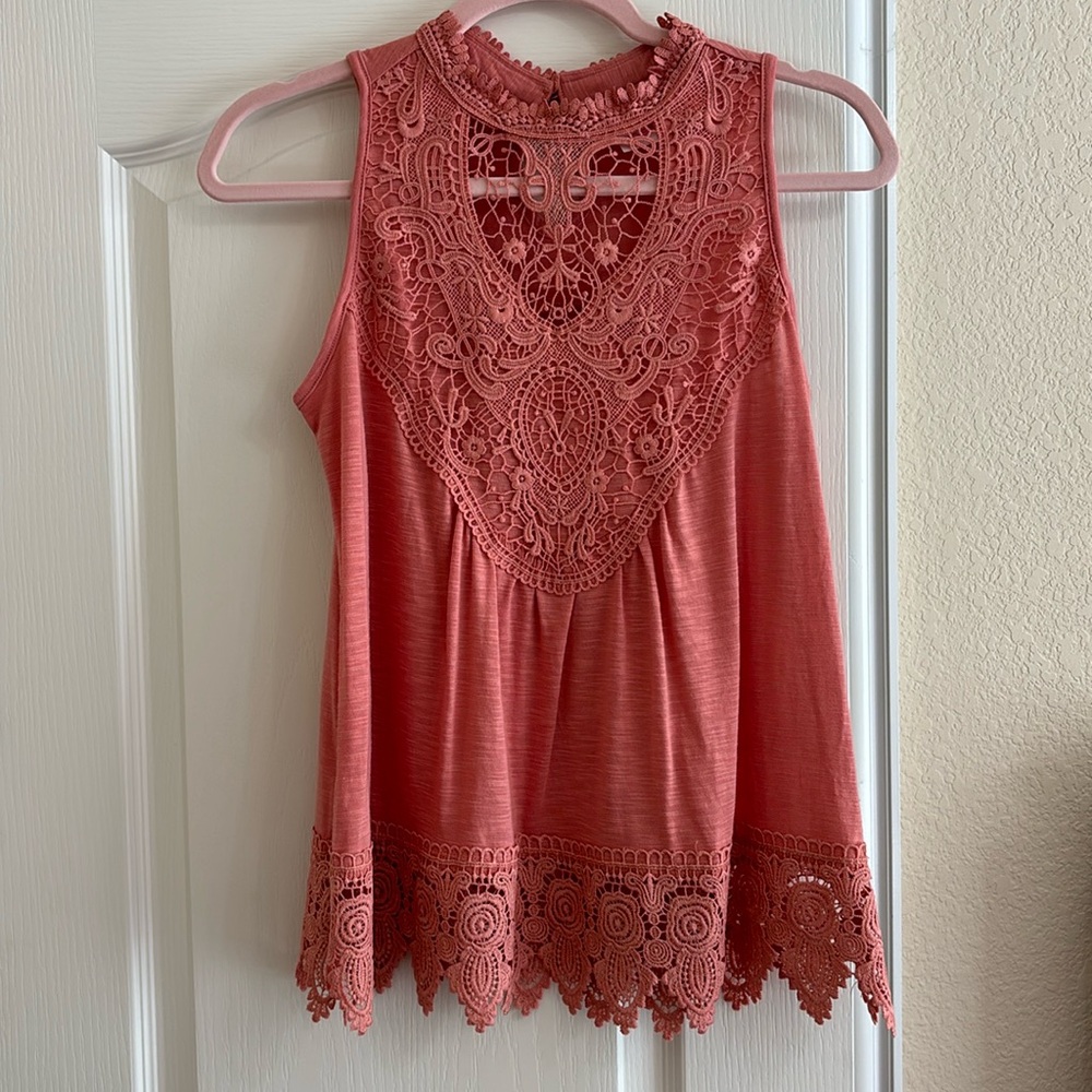 Sz S. Sleeveless top. Color is close to coral or peach.